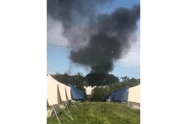 A golf buggy caught ablaze at on the first day of the Isle of Wight Festival 2024