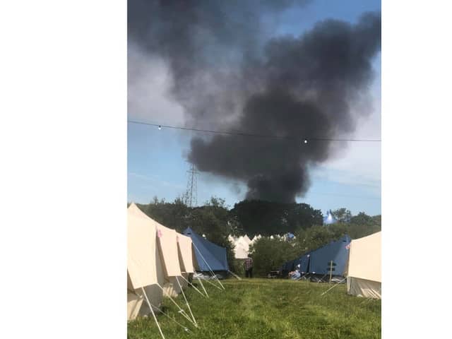 A golf buggy caught ablaze at on the first day of the Isle of Wight Festival 2024
