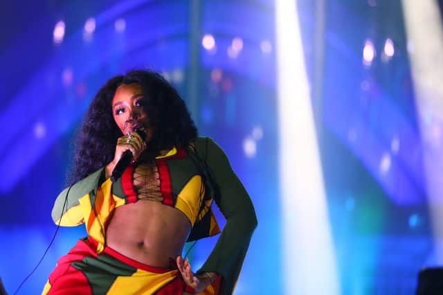 Grammy-award-winner SZA is set to close out the Pyramid Stage on Sunday as Glastonbury Festival 2024 draws to a close (Credit: Getty Images)