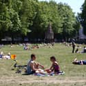 People enjoying warm weather during a heatwave in London. (Photo: Hollie Adams/Getty Images)