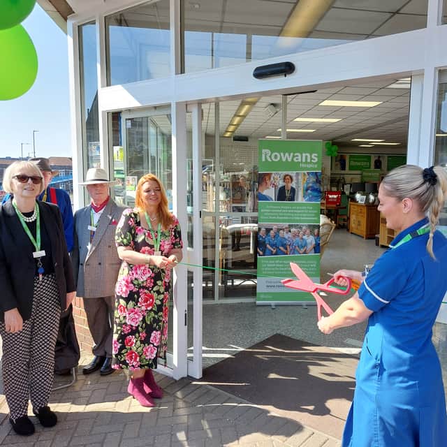 Jemima Adams cuts the ribbon to open the Cosham Emporium on Wednesday, June 26.
