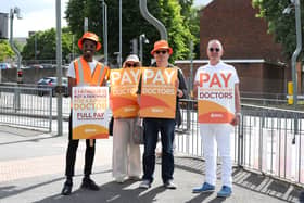 Junior doctors strike at the picket line outside Queen Alexandra Hospital: (left to right)Dr Raymond Effah, Penny Foskett, supporter, Jon Woods and Frank Minal, BMA industrial relations officer.
