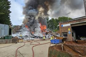 Firefighters from the Portsmouth area and Hampshire have rushed to try and extinguish a blaze at a scrap yard in Buriton, near Petersfield and the A3. Picture: HIWFRS