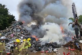Firefighters from across the Portsmouth area have been deployed to a large scrap yard fire in Greenway Lane, Buriton, Petersfield, on July 1. Picture: Hampshire and Isle of Wight Fire and Rescue Service
