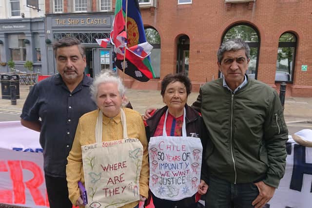 Demonstrators gathered outside the Victory Gate in Portsmouth to protest against CNS Esmeralda and the ship's use as an ambassadorial vessel for Chile. Picture: The News