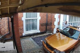 Man narrowly avoids catastrophe after forgetting handbrake.