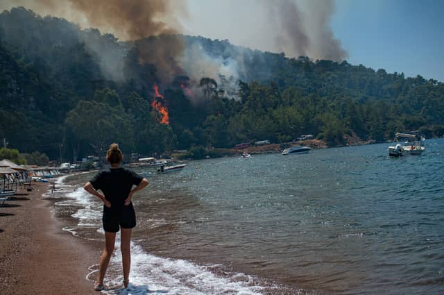 British tourists in Greece have been slapped with an "emergency alert" as a ferocious wildfire rages across the holiday hotspot.