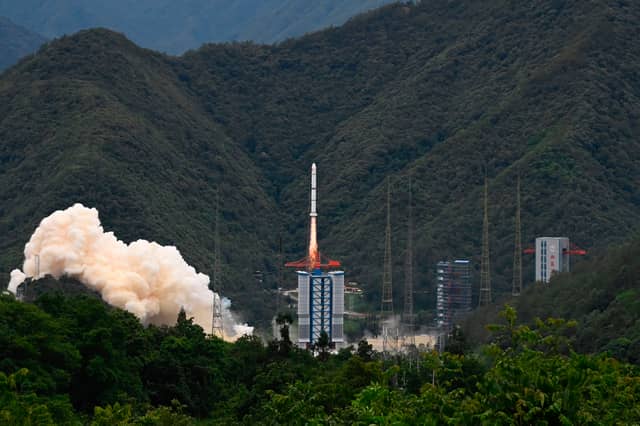 A rocket successfully lifts off from a space base in Xichang, in China's southwestern Sichuan province on June 22, 2024. (Photo by ADEK BERRY/AFP via Getty Images)