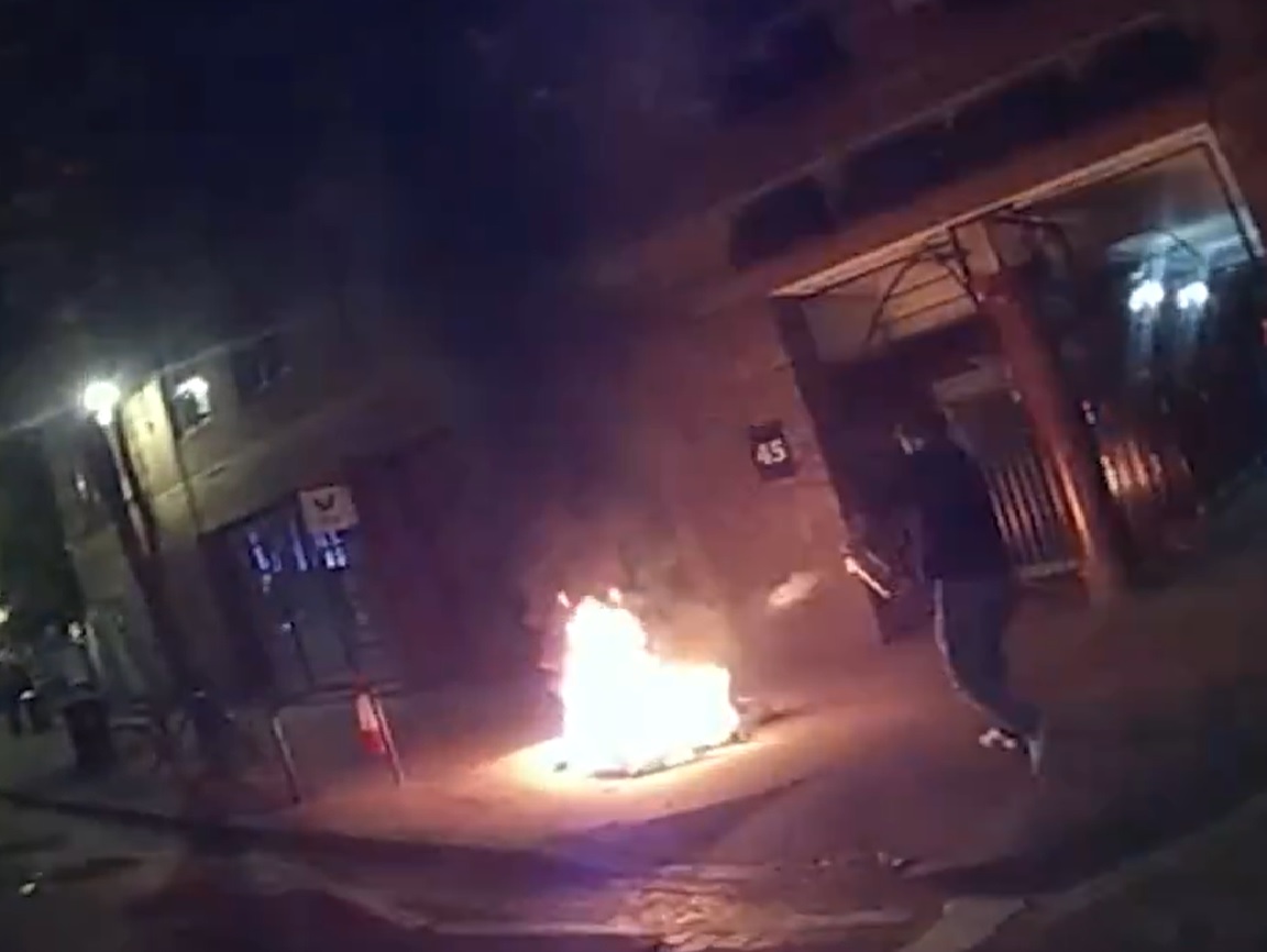 London: Multiple fires burn outside shops on city street as police race to extinguish blazes in dramatic video