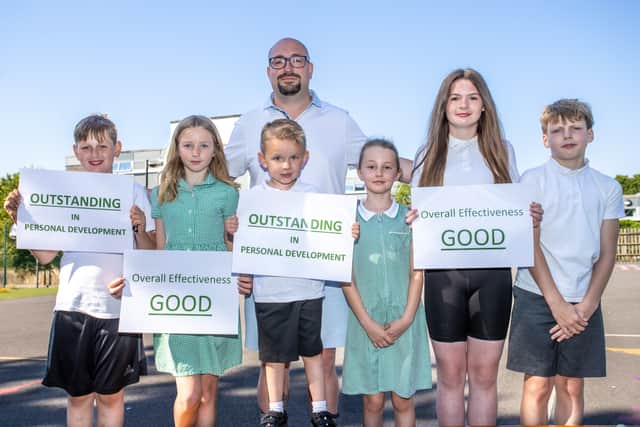 Woodcroft Primary School receiving their Ofsted Rating. Pictured - Head Teacher Mr Barry Fanning with students from Woodcroft Primary School celebrating their success.
Photos by Alex Shute 
