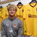 Former Pompey midfielder Cameron McGeehan has left Colchester to join Northampton