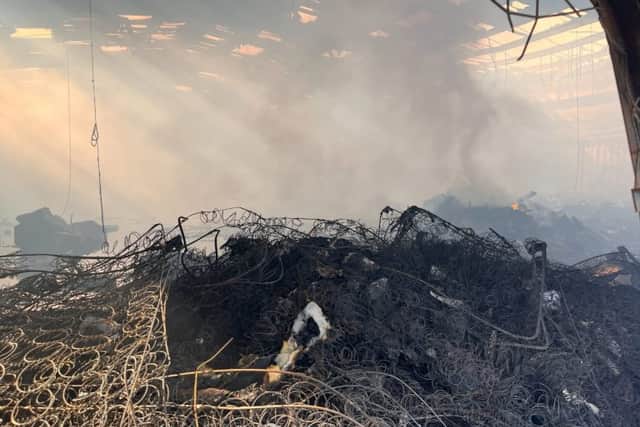 The smoke inside the two-story building at TJ Waste and Recycling