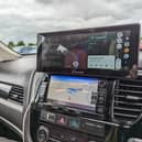 The Carpuride W103 sits on top of your dashboard, or on the windscreen, and gives you full access to Android Auto or Apple CarPlay