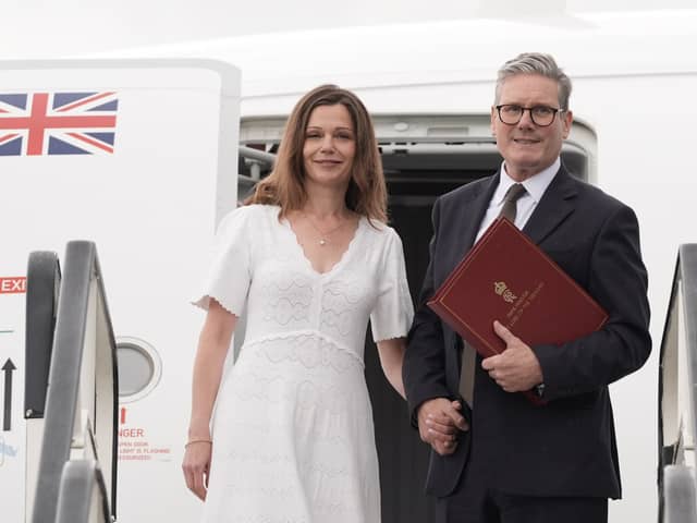 Prime Minister Sir Keir Starmer and his wife Victoria board a plane at Stansted Airport in Essex as they head to Washington DC to attend a Nato summit. The Labour government has been criticised over a lack of timescale for when the UK will increase its defence spending.