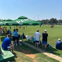 Pompey fans watching their team train in Medulin, Croatia, on the 2024 pre-season tour.