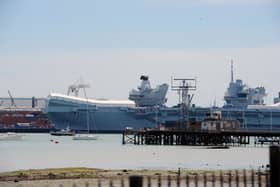 HMS Prince of Wales at Portsmouth Naval Base. The huge aircraft carrier was finally turned around after previous cancellations. Picture: Sarah Standing (110724-1766)