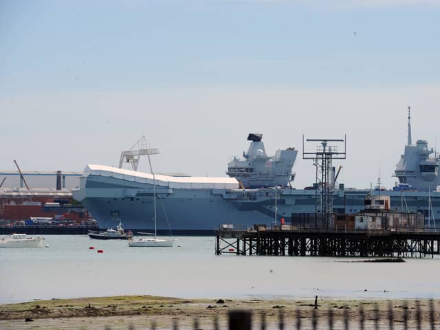 HMS Prince of Wales at Portsmouth Naval Base. The huge aircraft carrier was finally turned around after previous cancellations. Picture: Sarah Standing (110724-1766)