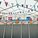 Hundreds of children across three Portsmouth schools are making a splash in a temporary swimming pool that has been opened, the first of its kind to open at a school in the city.