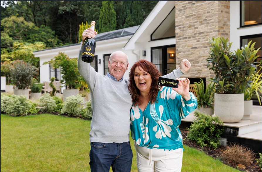 Couple win Omaze prize draw £3m Surrey home and can retire and live mortgage-free