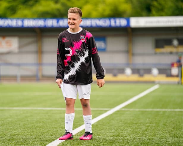 Jacob Lee, 13, organised his own charity football match in aid of Breast Cancer Now. Pictured is Jacob on the field at Westleigh Park. Picture: Jason Brown