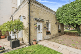 The property listing says: "No 1 is a unique duplex style property, formally the Orangery to this wonderful character building and enviably enjoys its own private entrance and garden area to the front." 