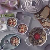 Le Creuset dishes, seen here on a dining table, are famous around the world