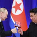 Russian President Vladimir Putin and North Korean leader Kim Jong Un toast during a reception at the Mongnangwan Reception House in Pyongyang on June 19, 2024. Photo by VLADIMIR SMIRNOV/POOL/AFP  - Russian state agency Sputnik - via Getty Images.