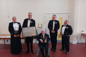 George Chandler presenting photograph to the HMS Sultan mess. A ceremony was held at the Gosport base for Blind Veterans UK.