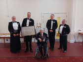 George Chandler presenting photograph to the HMS Sultan mess. A ceremony was held at the Gosport base for Blind Veterans UK.