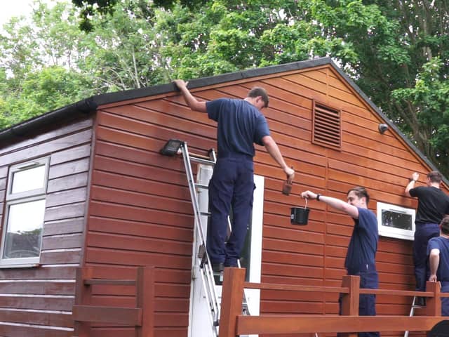 Volunteers from HMS Sultan at 6th Gosport (Rowner) Air Scout Group. Royal Navy sailors were restoring several parts of the town.