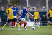 Anthony Scully goes on the attack against Gosport. Picture: Alex Shute