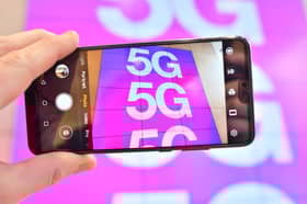 These are the 15 best cities to get a 5G signal on your phone in the UK according to OpenSignal. Photo: Justin TALLIS / AFP via Getty Images