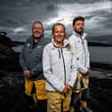 The top three wnners of the Clipper round the world yacht race - Winner Bob Beggs (left), second place Ineke van der Weijden (centre), and third place skipper James Finney (right)
