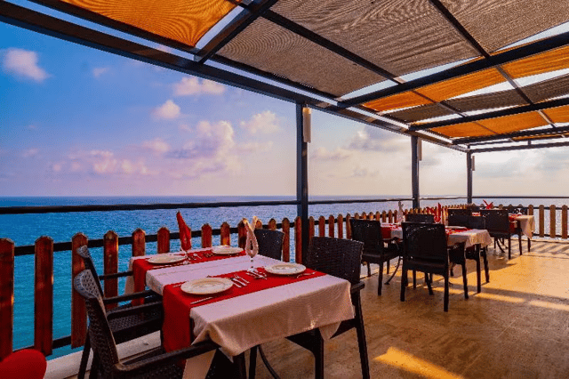 Enjoy a meal and sea views from your five-star hotel