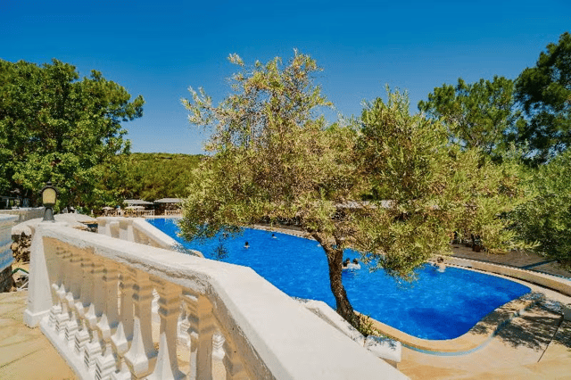The outdoor pool at Senza Garden Holiday Club
