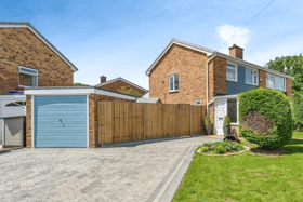 Equipped with a driveway and a garage, this home has plenty of parking available. 