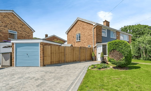 Equipped with a driveway and a garage, this home has plenty of parking available. 