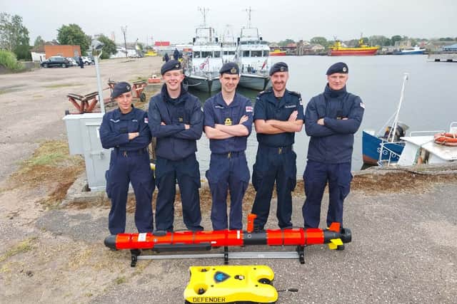 Royal Navy personnel with autonomous systems.
