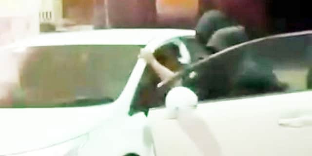 Men attempt to rob car with machete as driver fills up.