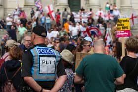 Protestors at Guildhall Square, Portsmouth, a demonstration which was sparked by three children being killed in Southport, Merseyside. Picture: Chris  Moorhouse (030824-28)