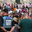 Protestors at Guildhall Square, Portsmouth, a demonstration which was sparked by three children being killed in Southport, Merseyside. Picture: Chris  Moorhouse (030824-28)