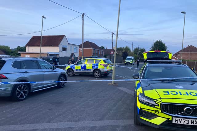 Police outside Morrisons where stabbing took place