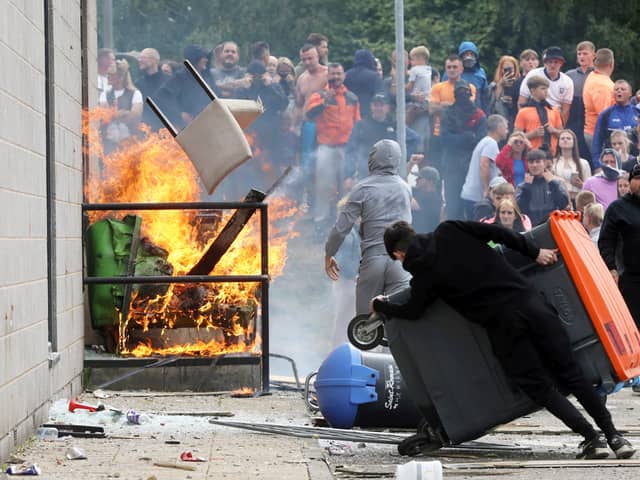 Trouble flares up outside of The Holiday Inn, Rotherham, South Yorks, where asylum seekers and immigrants are housed.  