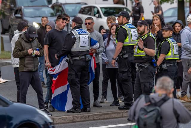 The M275 is brought to a standstill by Anti-immigration protesters. Picture: Mike Cooter (070824)