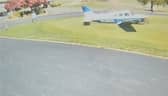 Plane smashes into golf course narrowly missing golfer.
