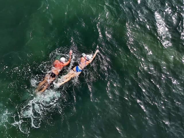 Gerrard Gosens, 54, trains in preparation for his channel crossing swim alongside guide swimmer.