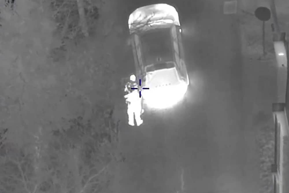 The police arresting Leroy Simpson. This is the dramatic moment an armed thug carjacked a vehicle at knifepoint during a test drive before leading police on a high-speed 10 mile chase. 