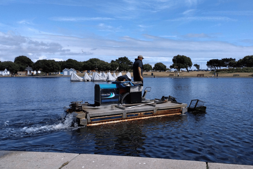 Portsmouth City Council contracted a company to improve the water quality of Canoe Lake last week as they set about removing the algae.