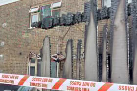 The fence and shed caught fire before spreading to the property.