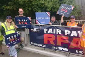 A new pay deal struck for Royal Fleet Auxiliary sailors has been hailed as a success, but more work needs to be done to improve the force. Pictured: Royal Fleet Auxiliary staff, who are members of the Nautilus International Union, staged a demonstration near the military base on Whale Island.